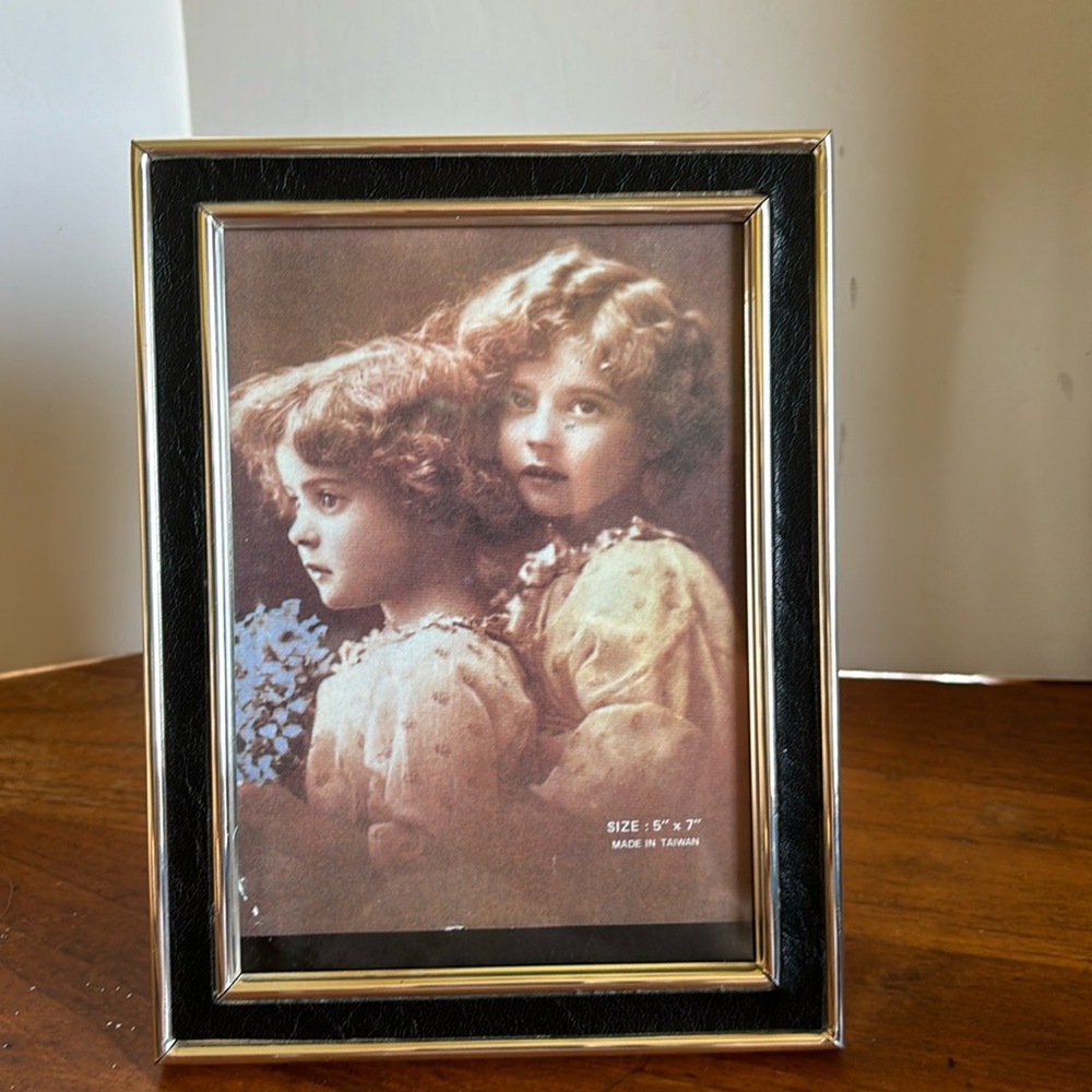 1990s Philip Whitney silver tone & black leather 5” x 7” table top picture frame